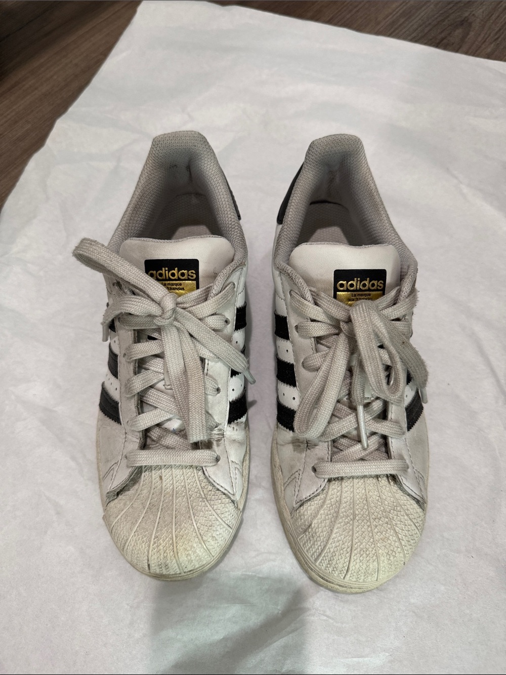 adidas Women’s White Sneakers with Black Three-Stripes